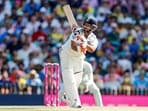 India's Rishabh Pant plays a shot to complete his half-century.