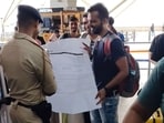 A man's hilariously oversized boarding pass at an airport has gone viral. A man's hilariously oversized boarding pass at an airport has gone viral.