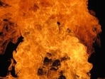 The traffic cops stopped a passing water tanker and used its water to control the flames. The traffic cops stopped a passing water tanker and used its water to control the flames.