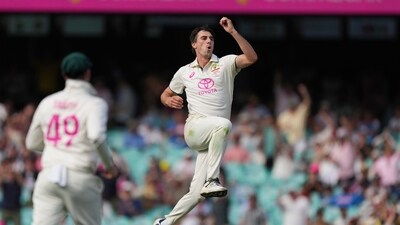 Australia's captain Pat Cummins celebrates after taking the wicket of India's Rishabh Pant during play on the second day of the fifth Test. (AP) Australia's captain Pat Cummins celebrates after taking the wicket of India's Rishabh Pant during play on the second day of the fifth Test. (AP)