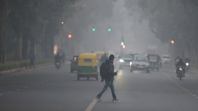 Commuters seen in a chilly and foggy winter evening in Delhi. (Photo by Raj K Raj/ Hindustan Times) Commuters seen in a chilly and foggy winter evening in Delhi. (Photo by Raj K Raj/ Hindustan Times)