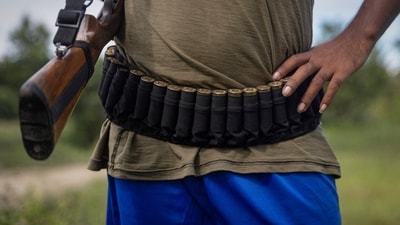 An armed Kuki man stands at a checkpoint at Kangvai village in Churachandpur district in Manipur. (REUTERS file)