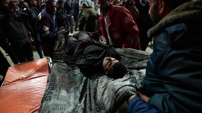 A wounded man is brought to Al-Aqsa Martyrs Hospital following Israeli army airstrikes, in Deir al-Balah, central Gaza Strip on Saturday. (AP) A wounded man is brought to Al-Aqsa Martyrs Hospital following Israeli army airstrikes, in Deir al-Balah, central Gaza Strip on Saturday. (AP)