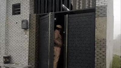 Police at the house where the double murder was carried out near Lamba Pind Chowk in Jalandhar on Saturday. (HT Photo) Police at the house where the double murder was carried out near Lamba Pind Chowk in Jalandhar on Saturday. (HT Photo)