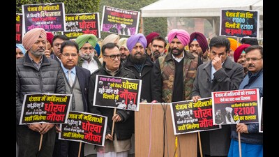 Punjab Congress president Amarinder Singh Raja Warring with party leaders in New Delhi on Saturday. (PTI)