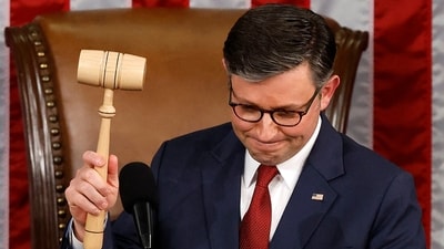 US Speaker of the House Mike Johnson holds up the gavel after being re-elected Speaker on the first day of the 119th Congress in the House Chamber of the US Capitol Building on January 3, 2025, in Washington, DC. (Getty Images via AFP) US Speaker of the House Mike Johnson holds up the gavel after being re-elected Speaker on the first day of the 119th Congress in the House Chamber of the US Capitol Building on January 3, 2025, in Washington, DC. (Getty Images via AFP)