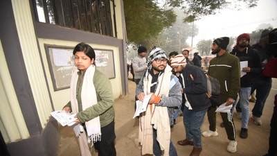 Applicants waiting in a queue outside examination center before entering an examination center to appear for the Bihar Public Service Commission (BPSC) 70th Prelims Exam, at Bankipur Girls High School, in Patna. (Santosh Kumar ) Applicants waiting in a queue outside examination center before entering an examination center to appear for the Bihar Public Service Commission (BPSC) 70th Prelims Exam, at Bankipur Girls High School, in Patna. (Santosh Kumar )