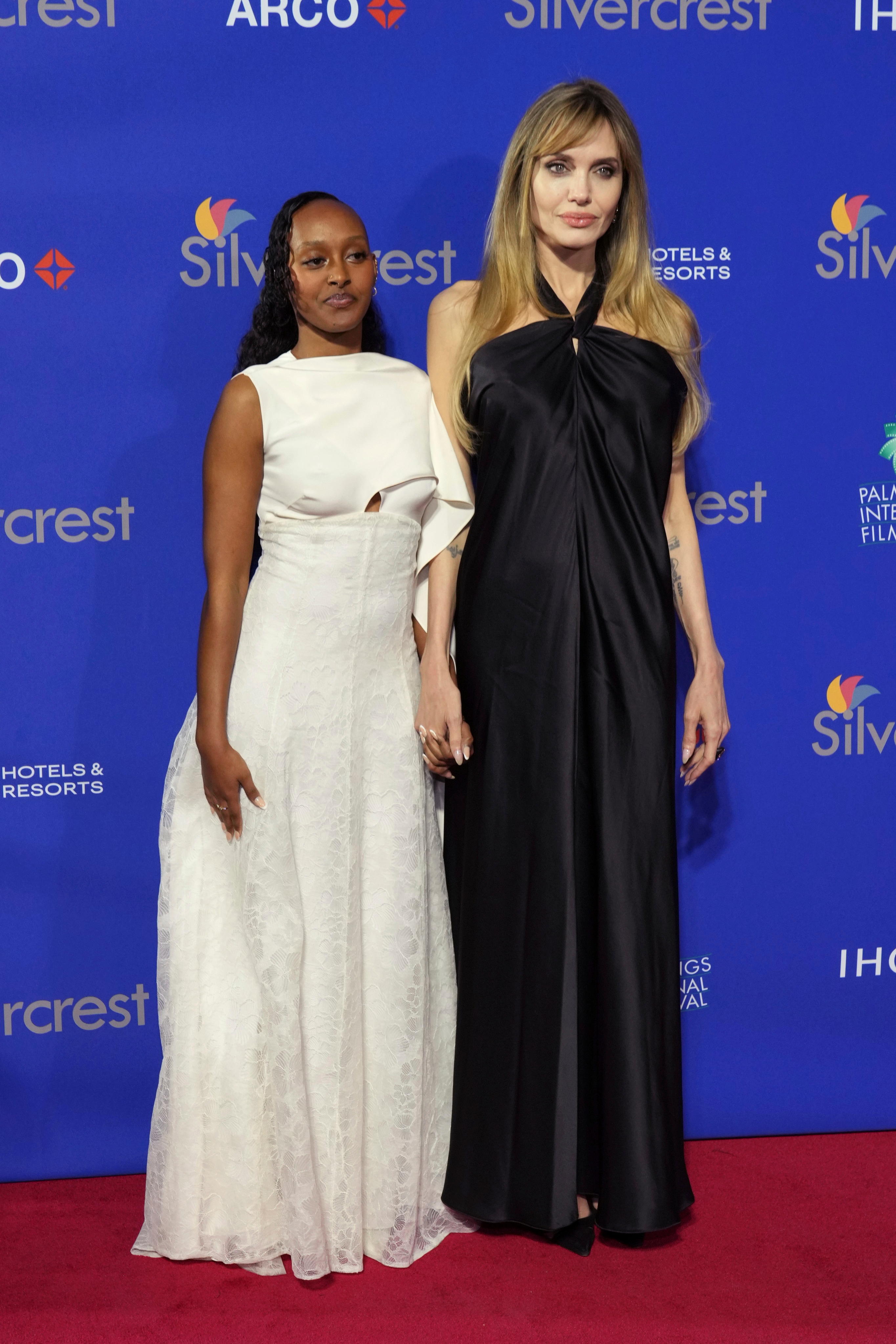 Zahara Jolie, left, and Angelina Jolie arrive at the 36th annual Palm Springs International Film Festival Awards Gala on Friday, January 3, 2025 in Palm Springs, California. (Photo by Jordan Strauss/Invision/AP)(Invision)