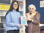 Neel Kamal Puri encouraging young author Ambreen Sidhu at the launch of her second book at Bahrisons, Chandigarh. PHOTOS: HTCS Neel Kamal Puri encouraging young author Ambreen Sidhu at the launch of her second book at Bahrisons, Chandigarh. PHOTOS: HTCS