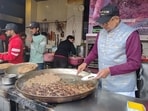 Lucknow's Tunday Kababi has bagged the sixth spot in the Top 100 Legendary Restaurants in the World list in the travel guide Taste Atlas. Owner Mohd Usman at the Aminabad food joint.(Deep Saxena/HT)