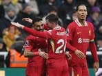 Liverpool's Mohamed Salah celebrates scoring a goal.
