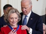 U.S. President Joe Biden presents the Presidential Medal of Freedom to Former U.S. Secretary of State Hillary Clinton, during a ceremony in the East Room of the White House, in Washington, U.S. January 4, 2025. REUTERS/Ken Cedeno
