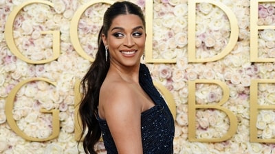 Lilly Singh arrives at the 82nd Golden Globes on Sunday. (Jordan Strauss/Invision/AP)