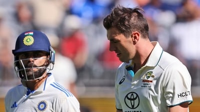 Australia's captain Pat Cummins, right, and India's Virat Kohli have a chat in between deliveries. (AP) Australia's captain Pat Cummins, right, and India's Virat Kohli have a chat in between deliveries. (AP)