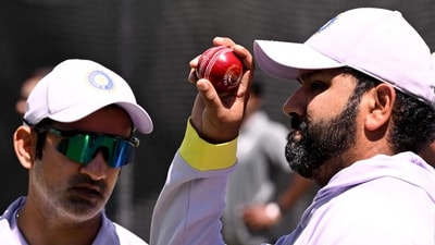 Sanjay Manjrekar reckons Rohit Sharma did not want Gautam Gambhir to get credit. Hence, he said that he “stood down” for the Sydney Test. (Photo by William WEST / AFP) / (AFP) Sanjay Manjrekar reckons Rohit Sharma did not want Gautam Gambhir to get credit. Hence, he said that he “stood down” for the Sydney Test. (Photo by William WEST / AFP) / (AFP)