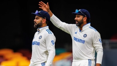 India's Rohit Sharma (R) gestures next to Virat Kohli. (AFP) India's Rohit Sharma (R) gestures next to Virat Kohli. (AFP)