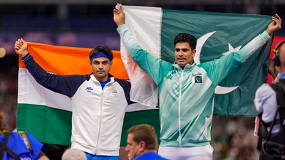 Silver medallist India's Neeraj Chopra and gold medallist Pakistan's Arshad Nadeem celebrate after the men's javelin throw final at the 2024 Summer Olympics, in Paris (PTI)