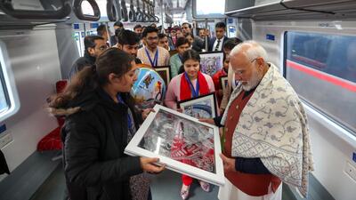 Prime Minister Narendra Modi interacts with students during his ride on the Namo Bharat train from Sahibabad to New Ashok Nagar on Sunday. (HT Photo) Prime Minister Narendra Modi interacts with students during his ride on the Namo Bharat train from Sahibabad to New Ashok Nagar on Sunday. (HT Photo)