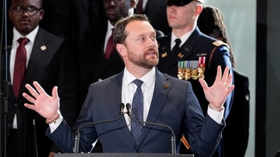 Jason Carter, grandson of former president Jimmy Carter, also spoke at the service (Alex Brandon/ REUTERS)