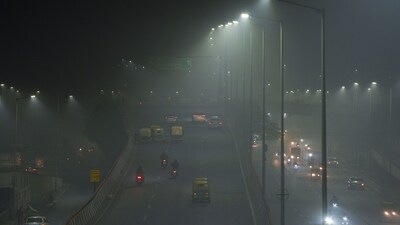 Dense fog enveloped the national capital on Saturday, reducing visibility to zero for an unprecedented nine-hour stretch, the longest spell of the season, according to the weather department. (PTI) Dense fog enveloped the national capital on Saturday, reducing visibility to zero for an unprecedented nine-hour stretch, the longest spell of the season, according to the weather department. (PTI)