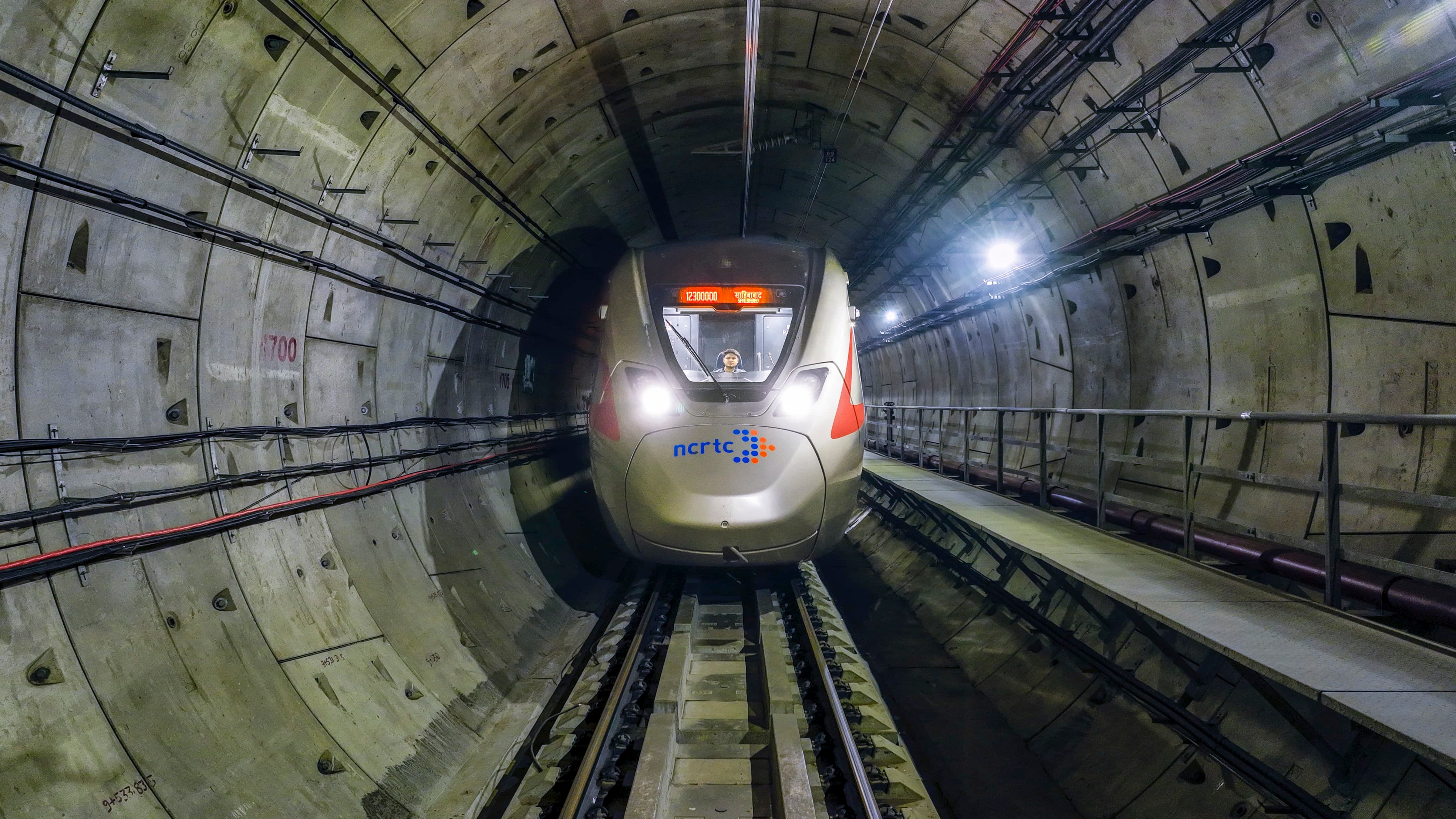 A Namo Bharat train is seen during a trial run. Prime Minister Narendra Modi will inaugurate an additional 13 km section of the Delhi-Meerut Namo Bharat Corridor between Sahibabad and New Ashok Nagar on Sunday. (PTI) A Namo Bharat train is seen during a trial run. Prime Minister Narendra Modi will inaugurate an additional 13 km section of the Delhi-Meerut Namo Bharat Corridor between Sahibabad and New Ashok Nagar on Sunday. (PTI)
