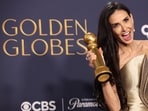 Demi Moore poses with the award for Best Performance by an Actress in a Motion Picture - Musical or Comedy, for The Substance, at the 82nd Golden Globe Awards in Beverly Hills, California, U.S., January 5, 2025. REUTERS/Mario Anzuoni     TPX IMAGES OF THE DAY