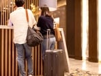  The company now requires unmarried couples to prove they’re in a relationship before they can check into its partner hotels. 