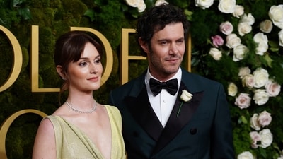Leighton Meester, left, and Adam Brody arrive. Brody impressed all with his show Nobody Wants This. (Jordan Strauss/Invision/AP)
