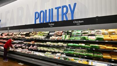 A shopper browses near the poultry section at a Walmart in Rosemead, California in December 2024. (AFP) A shopper browses near the poultry section at a Walmart in Rosemead, California in December 2024. (AFP)
