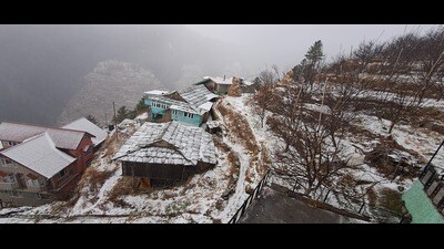 A view of village in Kotkhai after fresh snowfall in Shimla on Monday. (Deepak Sansta/ HT) A view of village in Kotkhai after fresh snowfall in Shimla on Monday. (Deepak Sansta/ HT)