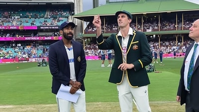 Sydney, Jan 03 (ANI): India's Captain Jasprit Bumrah and Australia's captain Pat Cummins at the toss ahead of their fifth and last test match, at Sydney Cricket Ground in Sydney on Friday. Indian Commentator Ravi Shastri is also present. (ANI Photo) (BCCI- X) Sydney, Jan 03 (ANI): India's Captain Jasprit Bumrah and Australia's captain Pat Cummins at the toss ahead of their fifth and last test match, at Sydney Cricket Ground in Sydney on Friday. Indian Commentator Ravi Shastri is also present. (ANI Photo) (BCCI- X)