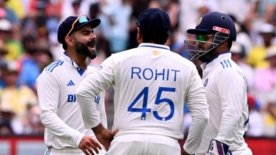 India's Virat Kohli (L) speaks with teammates Rohit Sharma (C) and Rishabh Pant (R) on the first day of the fourth cricket Test match between Australia and India (AFP) India's Virat Kohli (L) speaks with teammates Rohit Sharma (C) and Rishabh Pant (R) on the first day of the fourth cricket Test match between Australia and India (AFP)