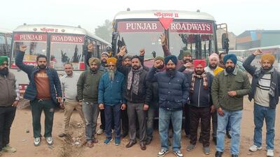 Contractual employees of Punjab Roadways raising slogans during a protest at the Amritsar bus depot on Monday. (Sameer Sehgal/HT)