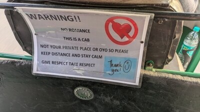 A photo, clicked by a passenger while sitting in the back of an auto, captured the warning issued by the driver, (X/yawnya)