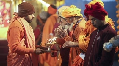 Sadhus performing an evening 'Aarti' on the banks of Sangam, the confluence of the Ganga, Yamuna and the Saraswati rivers.
(PTI Photo) Sadhus performing an evening 'Aarti' on the banks of Sangam, the confluence of the Ganga, Yamuna and the Saraswati rivers.
(PTI Photo)