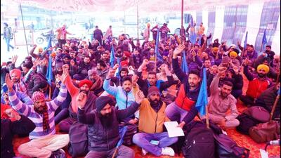 PRTC contractual employees holding a protest in Bathinda on Monday. (Sanjeev Kumar/HT)