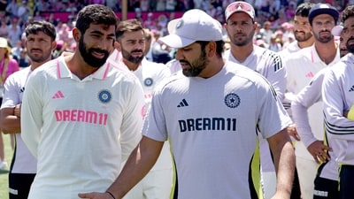 India's Jasprit Bumrah (2nd L) reacts with teammates during the trophy ceremony after the fifth cricket Test match between Australia and India (AFP)