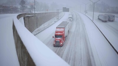 A county truck with a snowplough drives down a road on January 5, 2024, in Shawnee, Kansas. (AFP) A county truck with a snowplough drives down a road on January 5, 2024, in Shawnee, Kansas. (AFP)