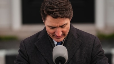 Canada Prime Minister Justin Trudeau announces his resignation as Liberal leader and prime minister outside Rideau Cottage in Ottawa on Monday, Jan. 6, 2025. (Sean Kilpatrick/The Canadian Press via AP) (AP) Canada Prime Minister Justin Trudeau announces his resignation as Liberal leader and prime minister outside Rideau Cottage in Ottawa on Monday, Jan. 6, 2025. (Sean Kilpatrick/The Canadian Press via AP) (AP)