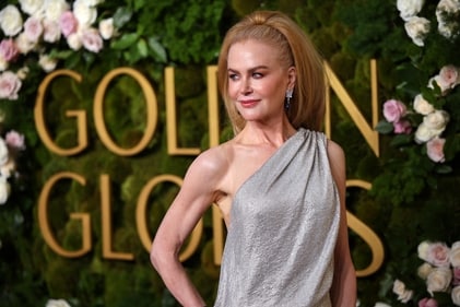 Nicole Kidman stuns at Golden Globes red carpet in silver metallic gown. (REUTERS)