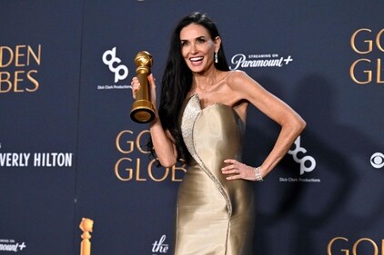 TOPSHOT - US actress Demi Moore poses with the Best Performance by a Female Actor in a Motion Picture � Musical or Comedy award for "The Substance" in the press room during the 82nd annual Golden Globe Awards at the Beverly Hilton hotel in Beverly Hills, California, on January 5, 2025. (Photo by Robyn Beck / AFP) (AFP) TOPSHOT - US actress Demi Moore poses with the Best Performance by a Female Actor in a Motion Picture � Musical or Comedy award for "The Substance" in the press room during the 82nd annual Golden Globe Awards at the Beverly Hilton hotel in Beverly Hills, California, on January 5, 2025. (Photo by Robyn Beck / AFP) (AFP)