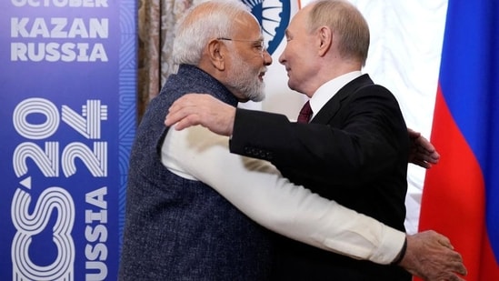 Russian President Vladimir Putin embraces Indian Prime Minister Narendra Modi during their meeting on the sidelines of the Brics Summit in Kazan, Russia (via REUTERS)