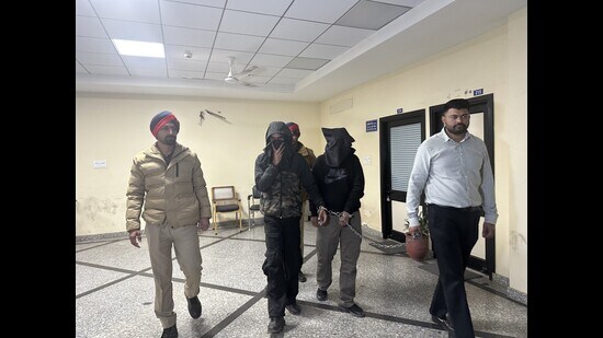 The accused in police custody in Mohali on Monday. (HT file)
