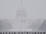 Trump inauguration: Security barriers surround the Capitol as snow falls ahead of a joint session of Congress to certify the votes from the Electoral College in the presidential election, in Washington, Monday, Jan. 6, 2025.