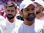 India's Virat Kohli (C) reacts with teammates during the trophy ceremony after the fifth cricket Test match between Australia and India at The SCG India's Virat Kohli (C) reacts with teammates during the trophy ceremony after the fifth cricket Test match between Australia and India at The SCG