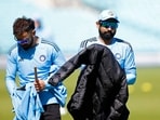 India's Mohammed Shami with Virat Kohli during a practice session