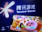 (Image for representation) "DreamStar", a mobile game by Tencent, is seen on a mobile phone next to a logo of Tencent Games, in this illustration picture taken March 19, 2024. REUTERS/Tingshu Wang/Illustration/File Photo