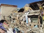 According to regional disaster relief headquarters, the quake struck at 9:05 am Tuesday (local time). The US Geological Service, however, put the quake's magnitude at 7.1. This picture shows damaged houses in Shigatse, southwestern Tibet region, after the earthquake hit the area.
