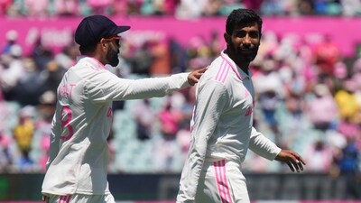 India's Jasprit Bumrah, right, and India's Virat Kohli react after the fifth cricket test between India and Australia at the Sydney Cricket Ground (AP) India's Jasprit Bumrah, right, and India's Virat Kohli react after the fifth cricket test between India and Australia at the Sydney Cricket Ground (AP)
