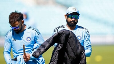India's Mohammed Shami with Virat Kohli during a practice session (Action Images via Reuters)